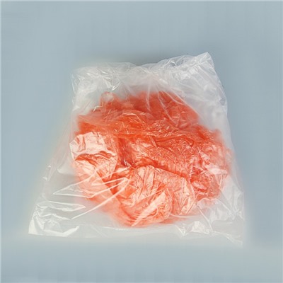 Бахилы оранжевые полиэтиленовые, детские, стандарт прочные, 300 х 100 мм., 1,5 г